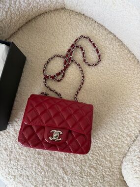 CHANEL Red Quilted Mini Flap Bag with Silver Chain
